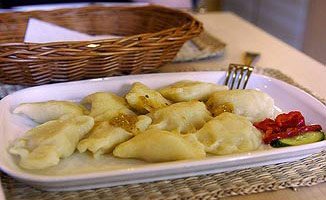 Plateful of boiled pierogi