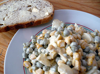 Polish salad made of pea, corn and eggs