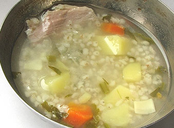 Polish krupnik in a pot