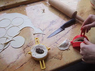 Making pierogi with a pierogi maker