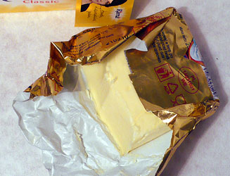 Polish butter in characteristic golden foil